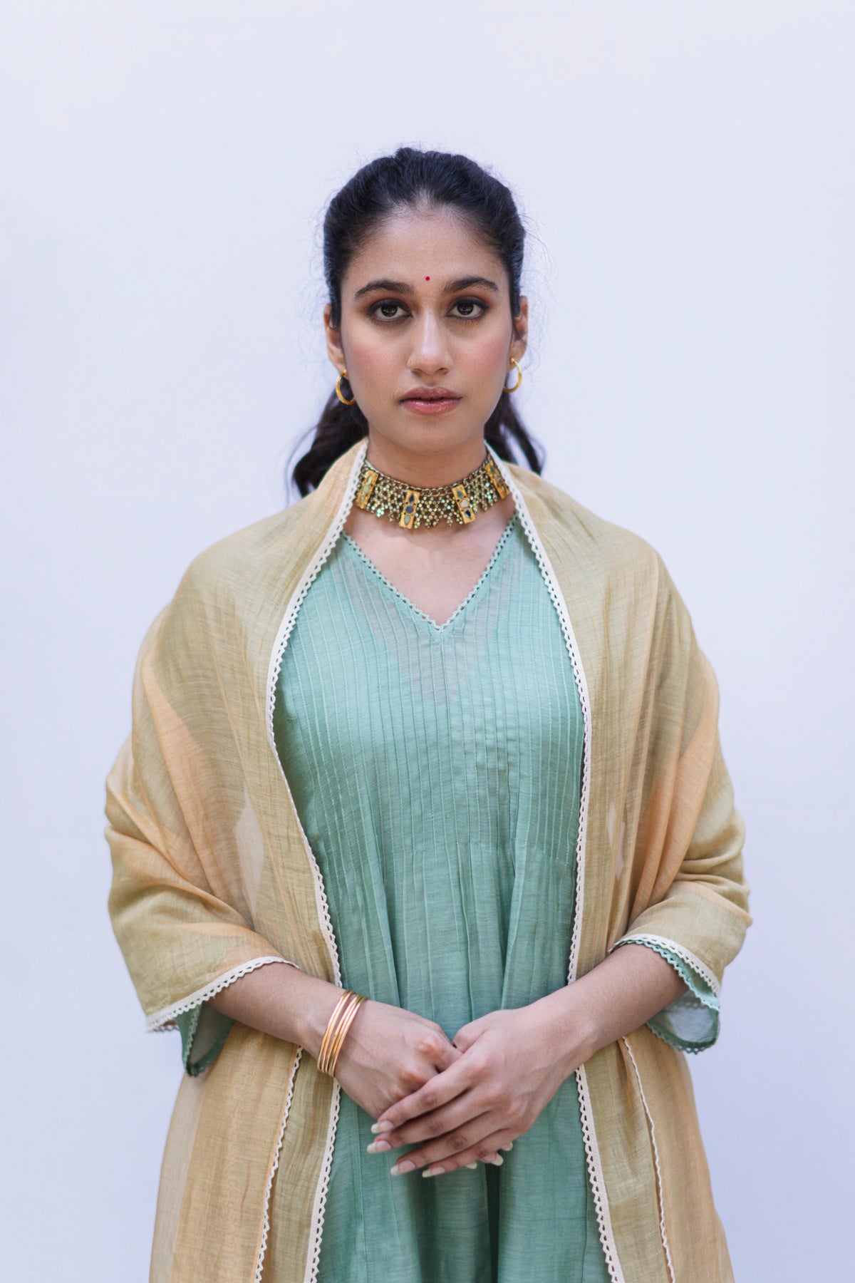 Bela Sage green handloom chanderi pintuck kurta with printed pants and yellow mustard lace stole