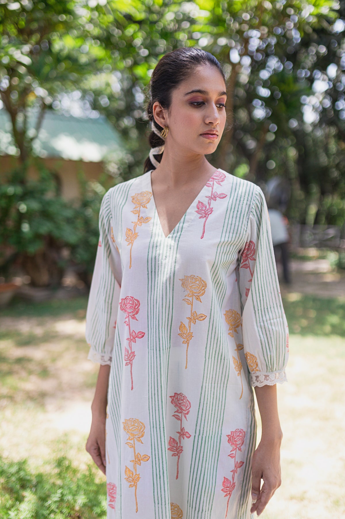 Bela Cream cotton block printed sage green stripe and multi colour rose v-neck kurta with printed pants