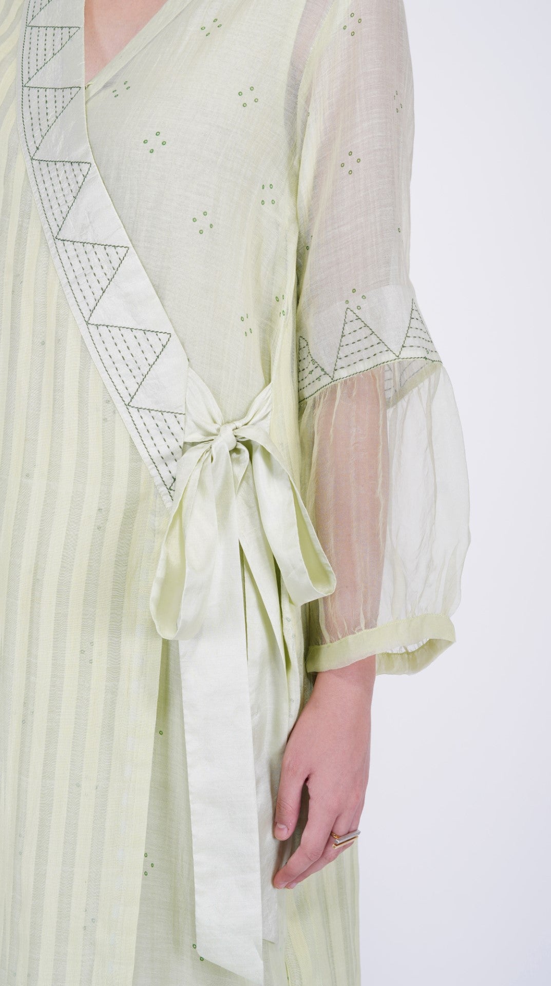 SAAWAN ANGRAKHA KURTA IN PISTA GREEN SOFT HANDWOVEN CHANDERI WITH DELICATE HAND STITCH DETAILS