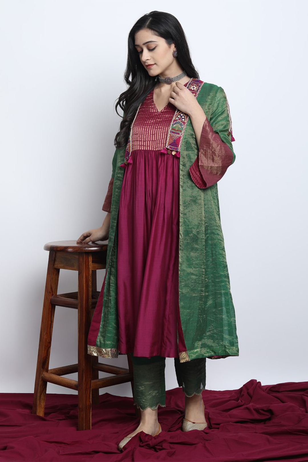 EMERALD GREEN CHANDERI EMBROIDERED PADMAVAT JACKET WITH GOLD YOK INNER AND TISSUE SCALLOP PANT