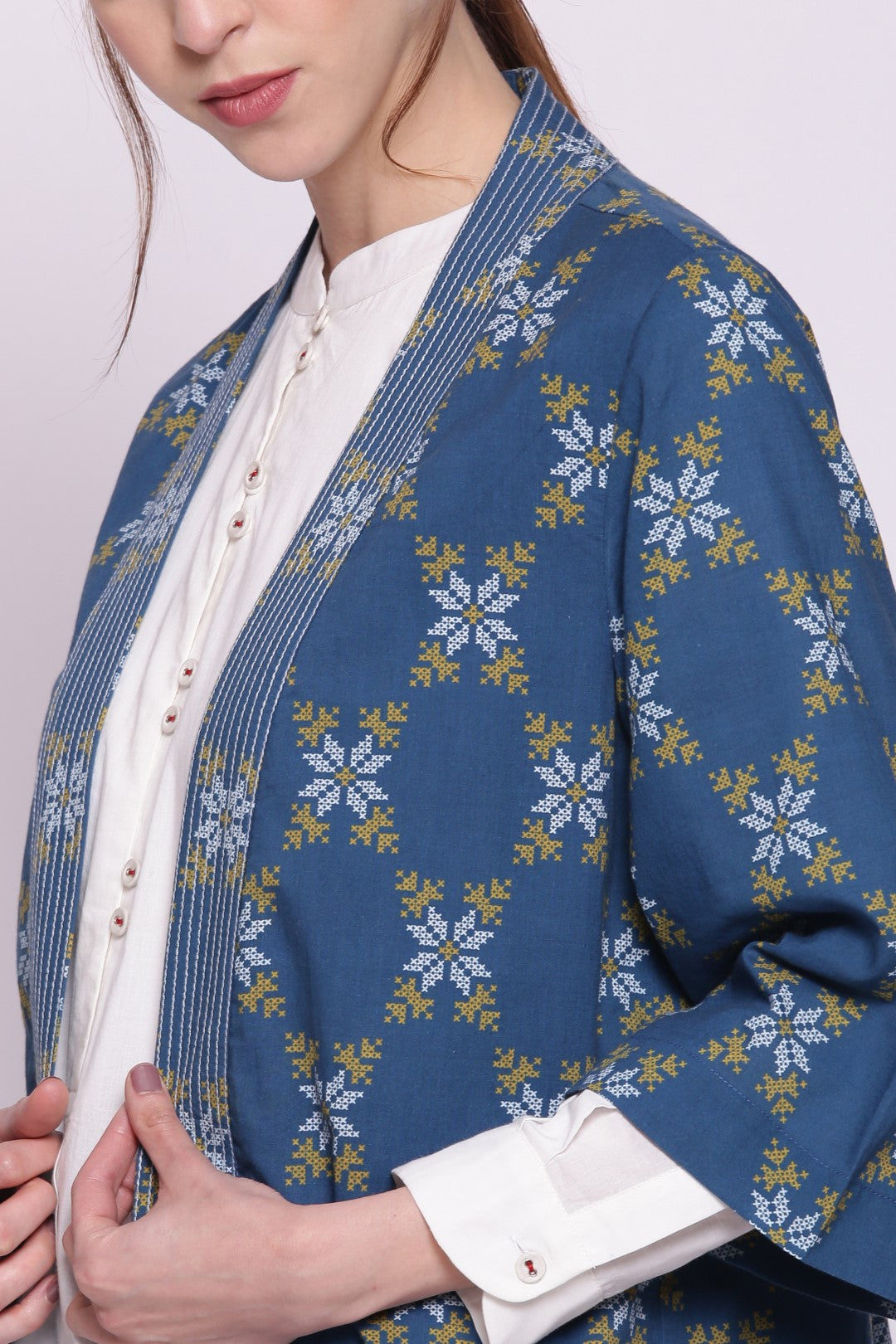 BLUE SNOWFLAKE PRINTED COTTON NORAGI JACKET WITH WHITE SHORT KURTA AND PRINTED PANTS