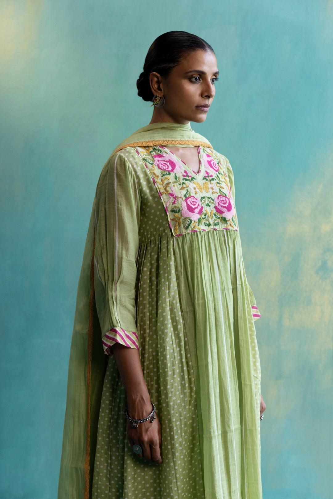 DIL-KASH OLIVE GREEN CHANDERI FRONT AND BACK FLORAL EMBROIDERY WITH SIDE PLEATS AND POLKAS CHANDERI KURTA