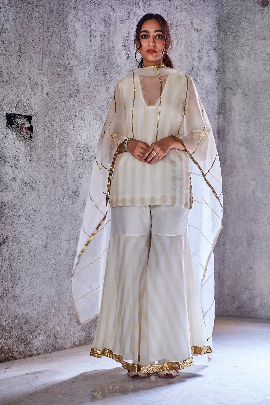 IVORY GOLD ZARI STRIPE HANDWOVEN CHANDERI MEERA GHARARA