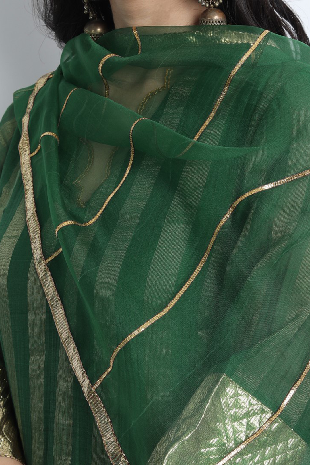 EMERALD GREEN ZARI STRIPE CHANDERI MEERA GHARARA WITH SHORT KURTA AND DUPATTA.