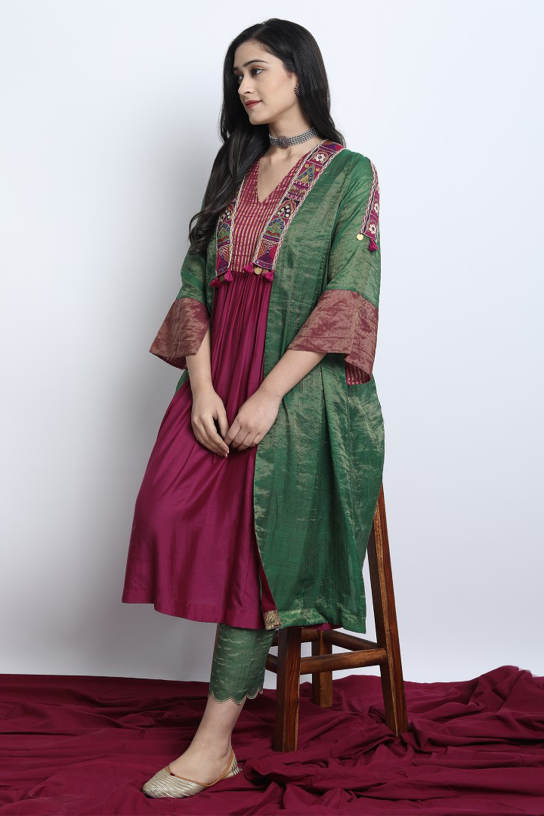 EMERALD GREEN CHANDERI EMBROIDERED PADMAVAT JACKET WITH GOLD YOK INNER AND TISSUE SCALLOP PANT